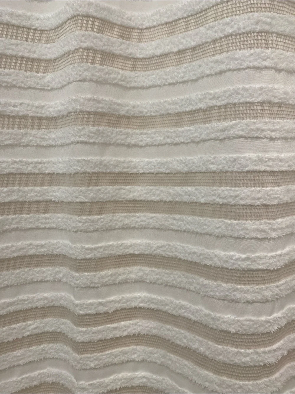 Cream and white striped shower curtain